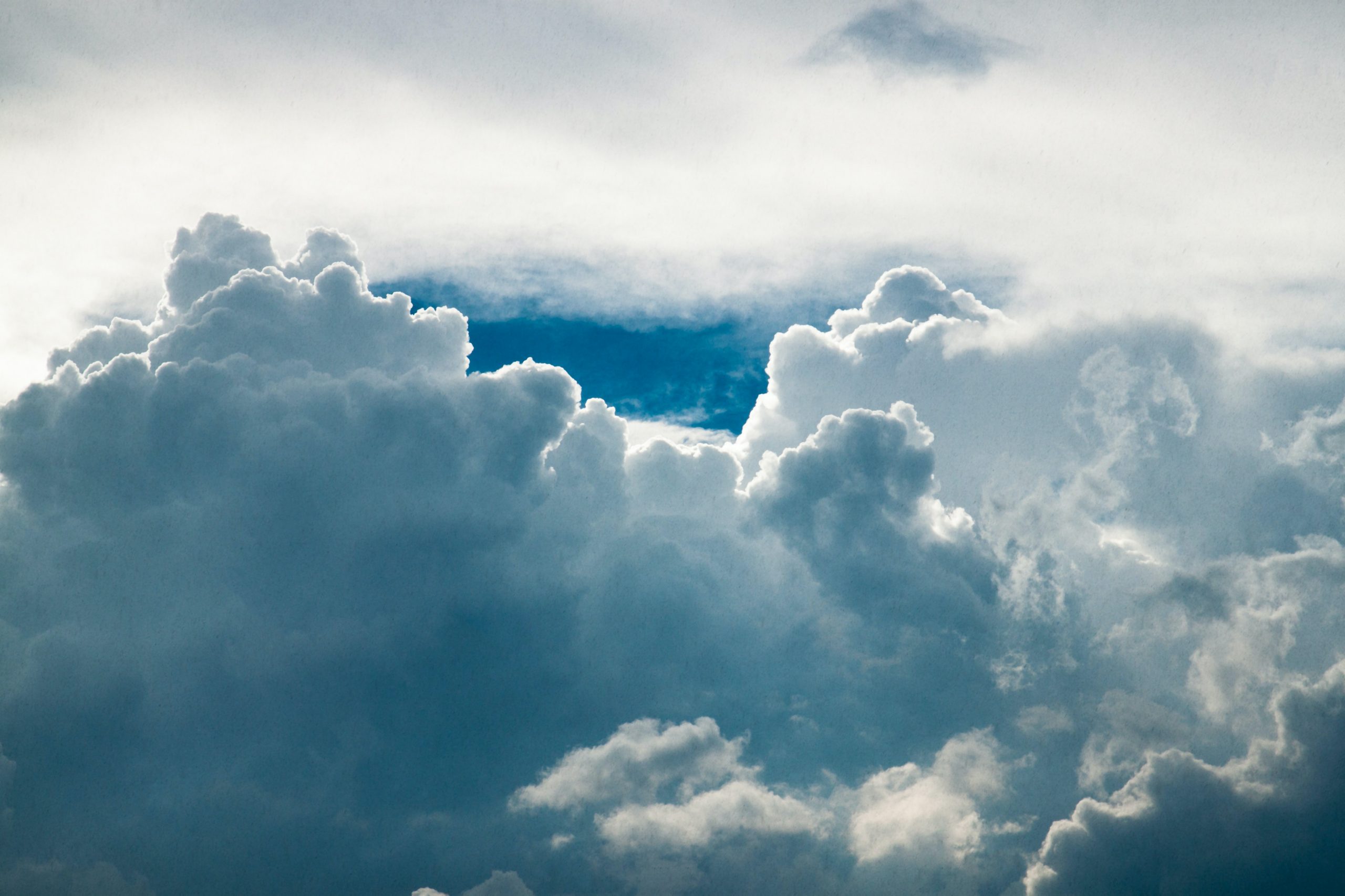 Dark and light clouds in a blue sky